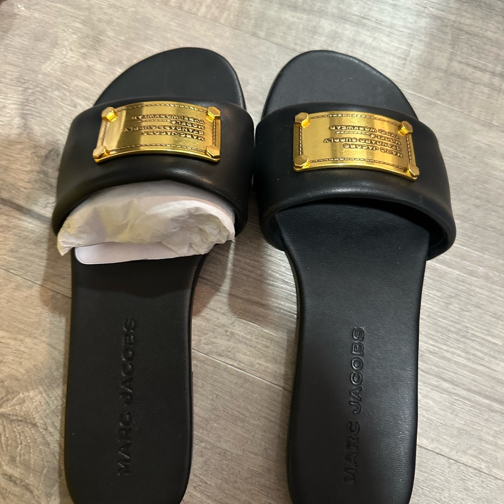 Marc Jacobs Black Slides with Gold Plaque